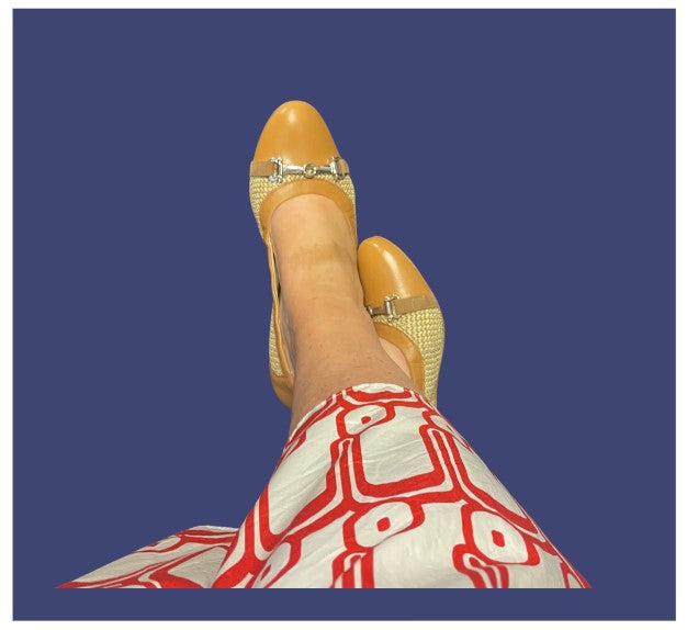 Person using Pair of Brown Ballet Type Shoes